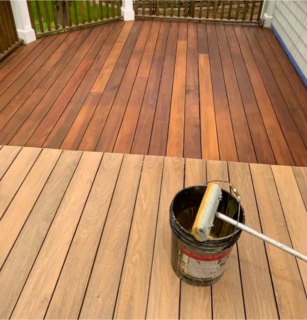 Exterior porch floor being stained