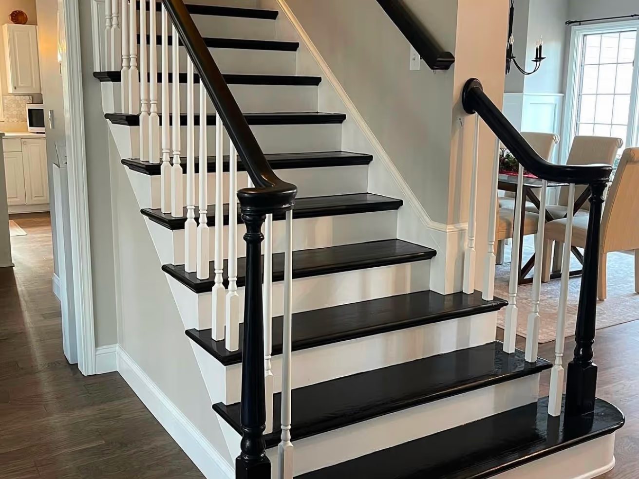 Black riser staircase with wood treads